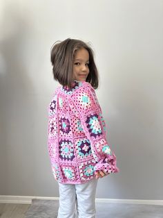 The love, devotion, precision, and tender care I invest in every crochet kid cardigan emanates through its exquisite craftsmanship.❤️ The model in the photo is my daughter. Her name is Melek ❤️ She is 7 years old.  This cardigan is super comfy clothing for your little play mate. For maximum comfort - it' super soft and there are no stitches on the side of the cardigan.  During all your little one's adventures this cardigan will flow with body movement, allowing the skin to breathe.  Hand knitted Crochet Kids Clothes, Childhood Clothes, Crocheted Cardigan, Play Mate, Tender Care, Comfy Clothing, Yarn Gifts, Kids Cardigans, Body Movement