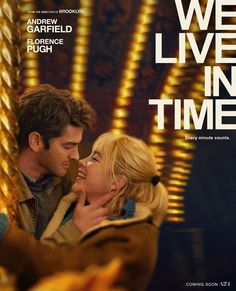 the movie poster for we live in time, featuring a man and woman embracing each other