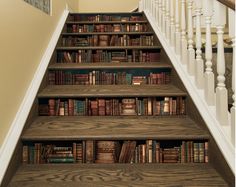 a stair case with many books on it