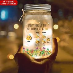 someone holding up a jar with bees on it that says, everything me fire you held us to die