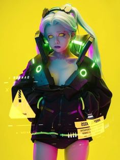 a woman with neon makeup and headphones standing in front of a yellow background wearing a futuristic outfit