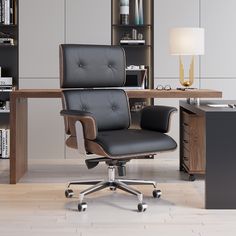 an office chair sits in front of a desk with bookshelves and a lamp