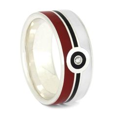 a red and black ring with a diamond in the center