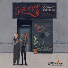 two people standing in front of a comic book store
