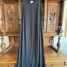 Great Black Maxi Dress - Scoop Neck - Crinkle Fabric- Straight Style. Finished Detailing At Neck And Arm Holes. Ptp 19 - Length 51” - To Ankle , Size Medium- But Will Fit A Small Nicely. Retails $75.00. Will Become Your “Go To Dress”About Town Shopping With Shirt Over It Or An Evening Elegant Date Or Special Event To Dress Up Or Down With Accessories. Long Black Maxi Dress, Crinkle Fabric, Black Maxi, Long Black, Over It, Black Maxi Dress, Special Event, Special Events, Scoop Neck