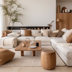 Modern Japandi living room, natural wood, beige and tan accents, living tree. Japandi Gray Sofa, Different Interior Styles, Living Room Japandi, Havenly Living Room, Japandi Interiors, Japandi Living, Bantal Sofa