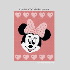 a cross stitch pattern with minnie mouse's head
