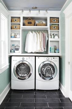 a washer and dryer in a laundry room with open shelving above them
