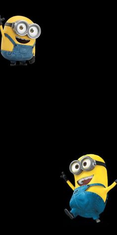 three minion characters in the dark with one pointing at the camera and another looking up