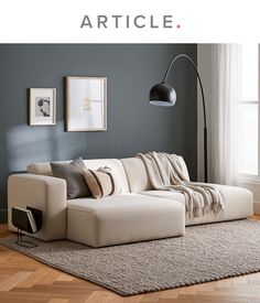 a living room scene with focus on the couch and rug, which is also featured in article article