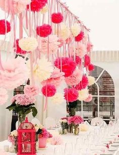 an instagram page for valentine's day with pink and white flowers hanging from the ceiling