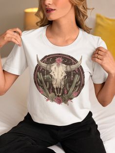 Step up your style with this vintage western shirt, featuring a stunning cow skull graphic! 🐂🌵 Adorned with southwest desert cacti and chic boho floral elements, this vintage shirt brings a touch of retro flair to any outfit. Perfect for vintage lovers and aficionados of southwestern and boho culture, it's a bold statement piece that's sure to turn heads. 🌼👚 This cowboy shirt and cowgirl shirt blend iconic wild west shirt elements with country Style, making it ideal for any country Side outi Boho Culture, Upcycle Clothes Diy, Western Vintage, Cowboy Shirt, Cowgirl Shirts, Cowboys Shirt, Country Side, Cow Girl, Cow Skull