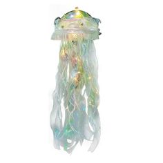 a white and green jellyfish hanging from a ceiling fixture with lights on it's sides