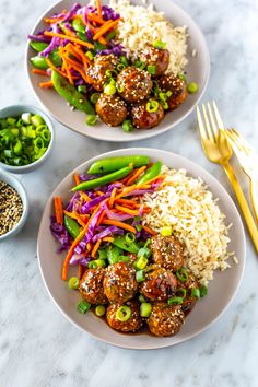 two plates filled with meatballs, rice and veggies
