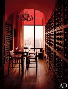 a dining room filled with lots of wine bottles