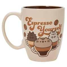 a coffee mug with two cats on it and the words espresso yourself in brown lettering