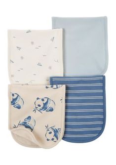 three baby bibs with blue and white designs