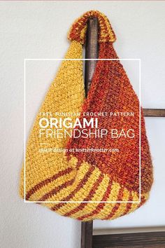 an origami bag hanging on the wall with text overlay that reads, origami friendship bag