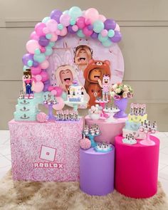 a birthday party with balloons, cake and decorations