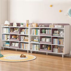 a child's room with bookshelves and toys