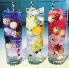 three glasses filled with different types of drinks