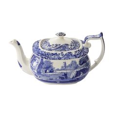 a blue and white teapot with a handle on it's side, sitting on a white surface