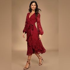 Lulus Exclusive! Nothing Beats A Day Spent In The Lulus Spectacular Feeling Burgundy Embroidered Faux Wrap Midi Dress! This Gorgeous Chiffon Midi Dress Has An Embroidered Floral Pattern Throughout Its Princess-Seamed Surplice Bodice, Long Sheer Sleeves, And High, Banded Waist With A Tying Sash. Flouncy, Asymmetrical Ruffles Add To The Faux-Wrap Effect Across The Midi Skirt. Hidden Back Zipper/Clasp. Lined. Shell: 100% Polyester. Lining: 100% Polyester Hand Wash Cold. Do Not Bleach. Line Dry. Iro Wedding Guest Outfits, Winter Wedding Guest Outfits, Burgundy Dress Outfit, Formal Winter Outfits, Winter Wedding Guest, Wedding Guest Outfit Winter, Winter Wedding Outfits, Long Sleeve Bridesmaid Dress, Winter Wedding Guest Dress