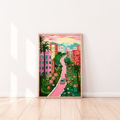 a painting hanging on the wall next to a wooden floor
