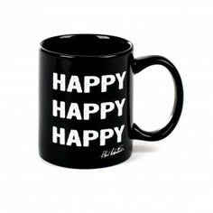 a black coffee mug with the words happy on it