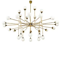a large chandelier with white glass balls hanging from it's brass frame