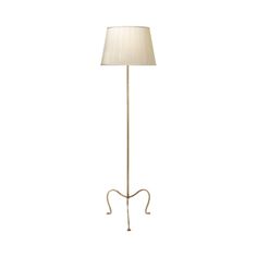 a floor lamp with a white shade on the base and a light bulb in the middle