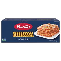 a box of lasagna on a white plate