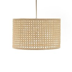 a light that is hanging from the ceiling with a rattan pattern on it's side