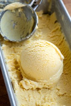 a scoop of ice cream in a metal pan