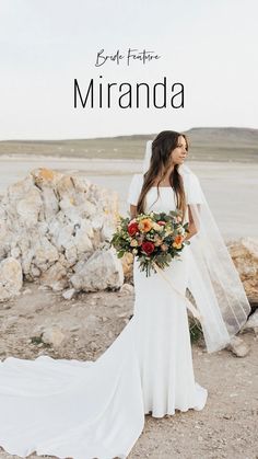 a woman in a wedding dress holding a bouquet and standing next to rocks with the words bridal fashion miranda on it