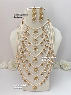 Satlada Kundan Raani Haar comes with beautiful Earrings/bridal jewelry/Long necklace Set/Rani Haar/long Mala set/Pearl long necklace/Seven layer long necklace  Bridal /Indian Wedding jewelry/bridal jewelry/ Indian jewelry /Kundan Jewelry/Kundan pearl choker/ Punjabi necklace/ Pakistani jewelry/High quality Indian Jewelry Standard shipping/delivery timeline Below are the estimated delivery times after the order is shipped/ dispatched ---> USA delivery timeline * 4-8 business days to major urban centers in USA. It may take 2-3 days extra to remote locations ---> Canada delivery timeline  * GTA  & Montreal : 2-3 business days  * Rest of Ontario/Quebec : 2-4  business days * Rest of Canada: 4-8 business days (Please consider 1-2 extra business days to very remote locations) ---> Europe/Middle Pearl Long Necklace Designs, Kundan Mala, Punjabi Necklace, Indian Long Necklace, Raani Haar, Pearl Long Necklace, Bridal Indian, Long Necklace Set, Jewelry Kundan