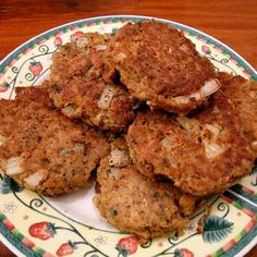 some food is sitting on a plate on a wooden table and ready to be eaten