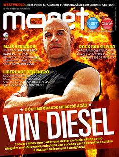 a magazine cover with a man in black shirt and flames on the backround