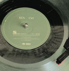 a record player's turntable sitting on top of a table