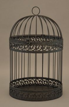 a birdcage is shown with the top open