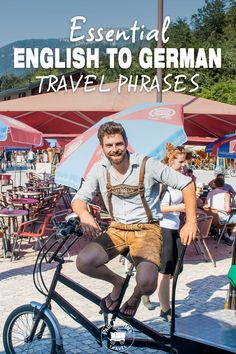 a man on a bike with an umbrella over his head and the words essential english to german travel phrases