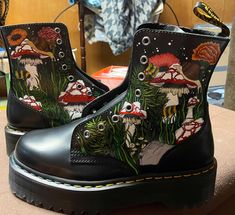 The boots in the photo are a pair I painted recently for myself but can absolutely paint for you, we can work together on a design and color scheme. I can rush the order if needed but cannot guarantee exact time as I will need to order your boots and wait for them to come in, to begin.  Can't wait to make your idea come true! Doc Martens Embroidered, Cottage Core Mushroom Outfit, Hand Painted Doc Martens, Cool Doc Martens, Painted Boots Diy Ideas, Cottage Core Boots, Custom Docs, Painted Doc Martens, Custom Doc Martens