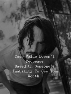 an image of a man with his head down and the caption below it reads, your value doesn't increase based on someone's inability to see your worth