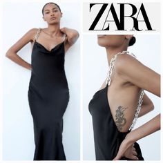 A Bold Number, This Zara Chain Strap Satin Effect Dress Is Honestly Jaw-Dropping! This Sensational Slip Dress Comes In Supple Satin And Features A Figure-Skimming Silhouette, Deep Cowl Neckline, Matalic Silver Criss-Cross Chain Straps Detailing. Dial Down For Daytime Wearing By Teaming With Leather Ankle Boots And An Oversized Denim Jean Jacket. New With Tags Size: Xs Color: Black 100% Polyester Art: 9297 840 800 Pit To Pit: 17" Waiste: 16" Hips: 21 Full Leangth From Neckline: 49" Photos Taken I Black Stain Dress, Satin Camisole Dress, Blush Pink Lace Dress, Plunge Midi Dress, Sea Dress, Zara Satin, Zara Black Dress, Orange Midi Dress, Satin Camisole