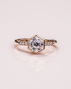 an engagement ring with a diamond in the center