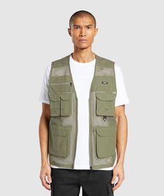 LAYER UP. LEVEL UP. Layer up and level up your fit wherever you’re heading in the Woven Vest. • Functionality AND style• Large cargo pockets with velcro fastening• Breathable mesh material• Side pockets for your hands SIZE & FIT• Regular fit• Regular length• Model is 6'1" and wears size M MATERIALS & CARE• Main: 100% Nylon• Ripstop: 100% Cotton SKU: A5A6U-ECJP Shot Ideas, Mesh Material, Level Up, Mens Jackets, Work Wear, Fashion Inspo, Green, How To Wear