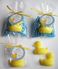 three yellow rubber ducks are in plastic bags