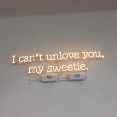 a neon sign that says i can't unlov you, my sweetie