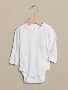 Perfect for early adventurers, SUPIMA® cotton remains a favorite for its softness, strength, and American roots.  Here, our designers created a classic silhouette with utilitarian touches: a classic chest pocket, snaps at the shoulder, and an easy-a Manche, Baby Essentials, Neutrogena Makeup Remover, Neck Snap, Smoothie Healthy, Bodysuit White, Banana Smoothie, Supima Cotton