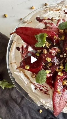 a dessert with fruit and nuts on top